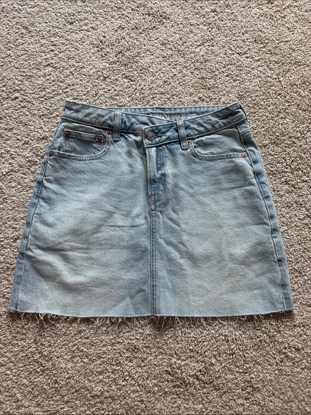 American Eagle Outfitters Light Blue Denim Mini Skirt with Frayed Hem